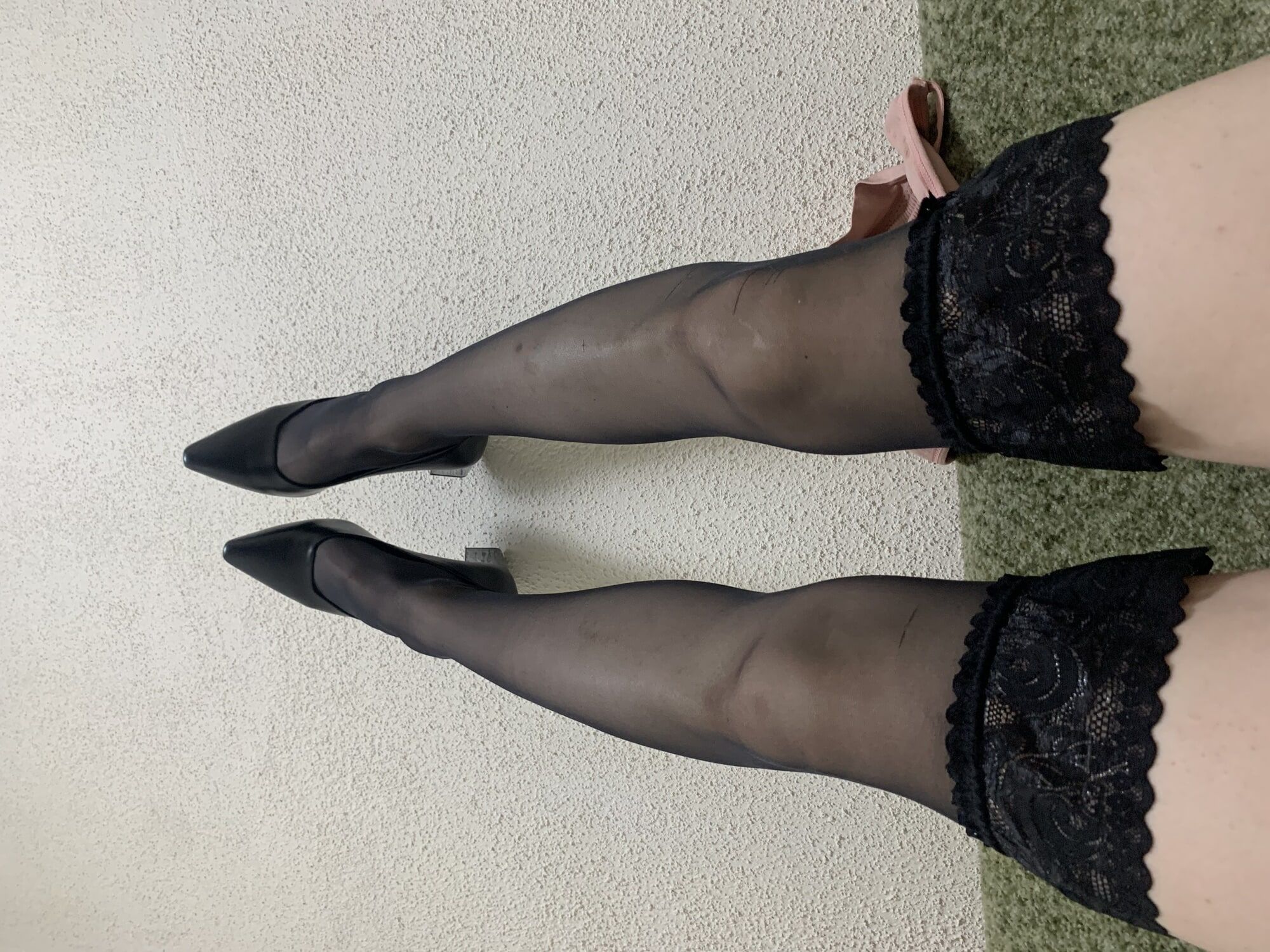 Tranny sissy crossdresser pull legs in stockings with heels 
