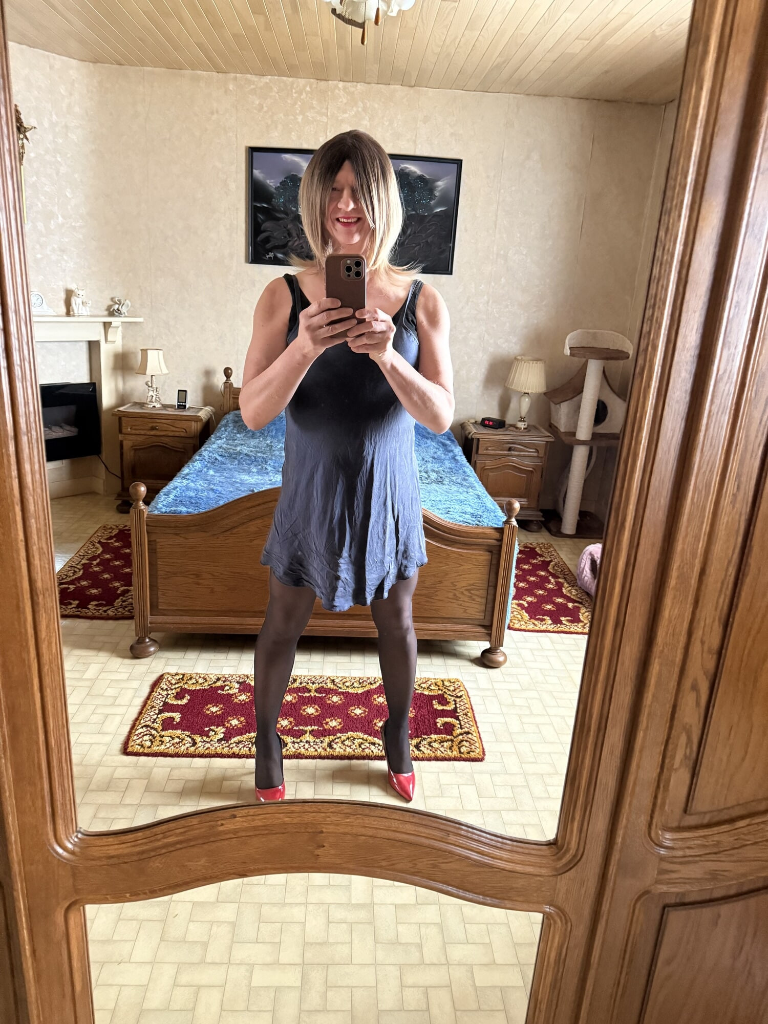 Evy finally as a blonde wearing a short blue nightgown #2