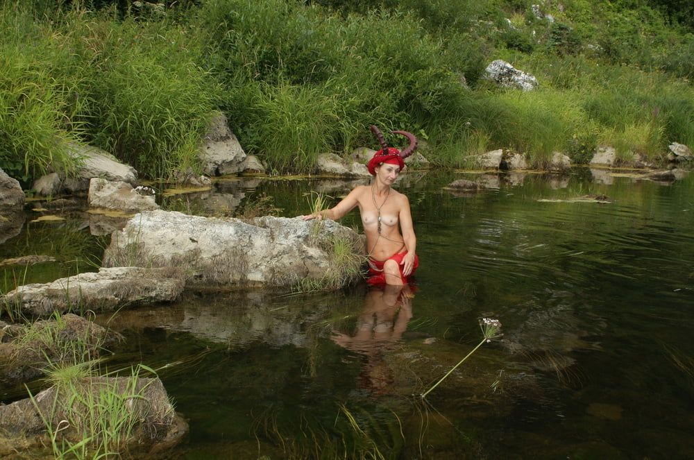 With Horns In Red Dress In Shallow River #15