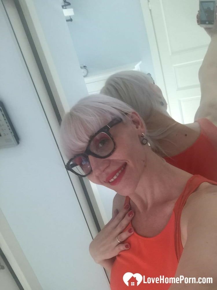 Blonde MILF with glasses teasing with nudes #5