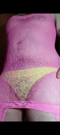 Playing in wife&#039;s pink fishnet suit and my neon panties 