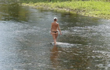 nude in rivers water         