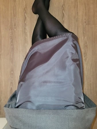 grey pencil skirt with black silky half slip         