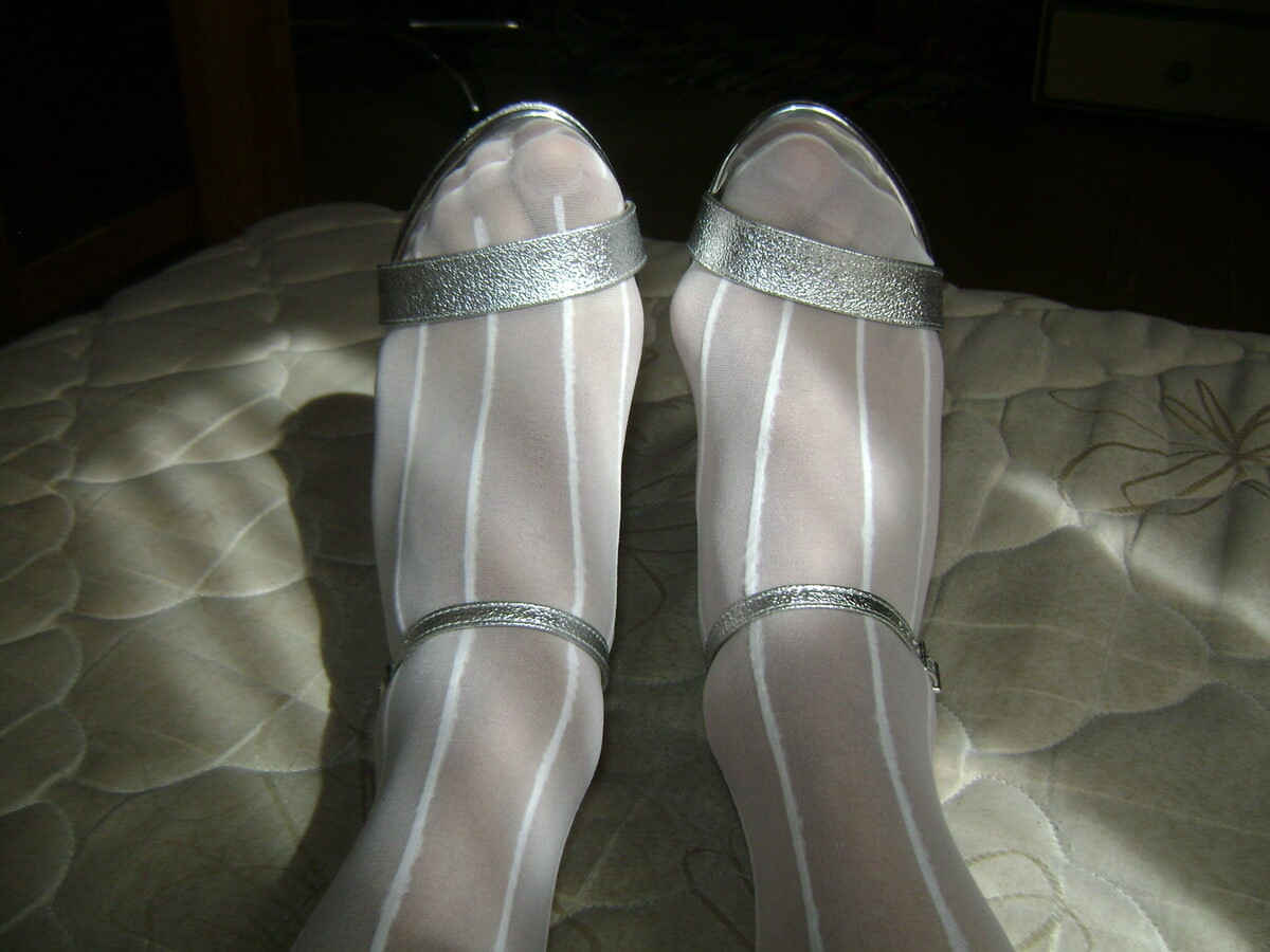 In white lingerie with heels and stockings #21