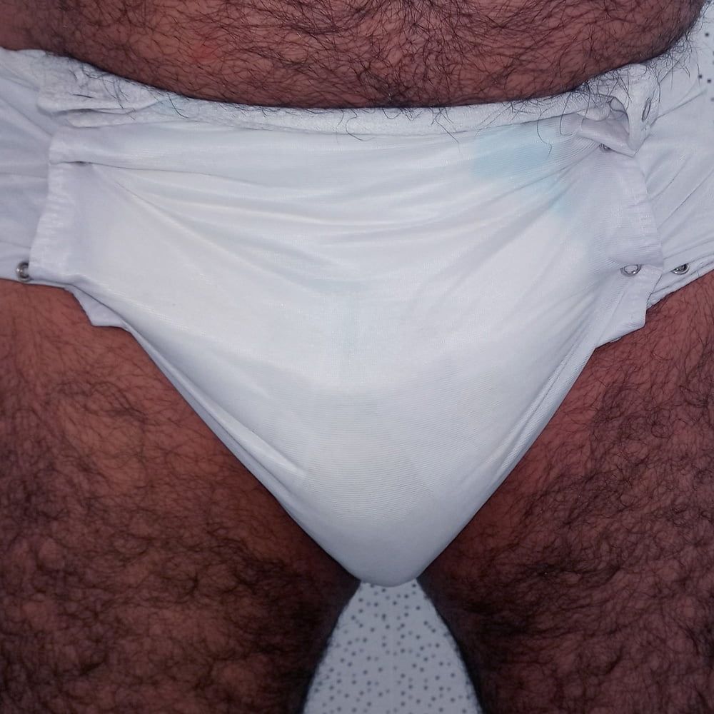 SHOWING WHITE DIAPER IN WORK BATHROOM. #5