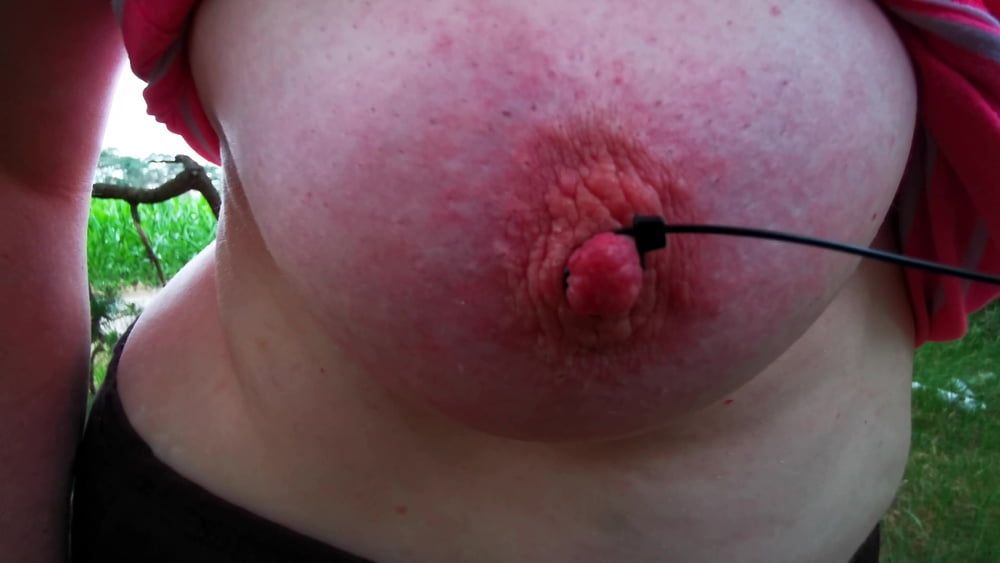 Painful using her nipples in public #8