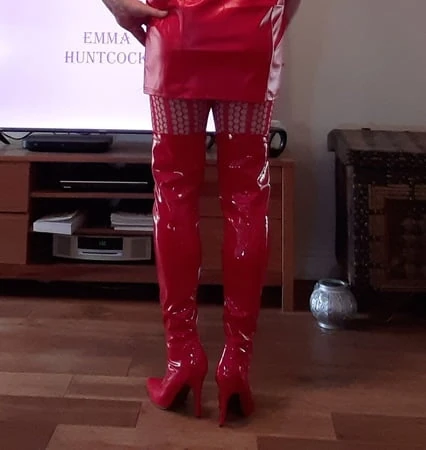 sissy in red lingerie and thigh boots         