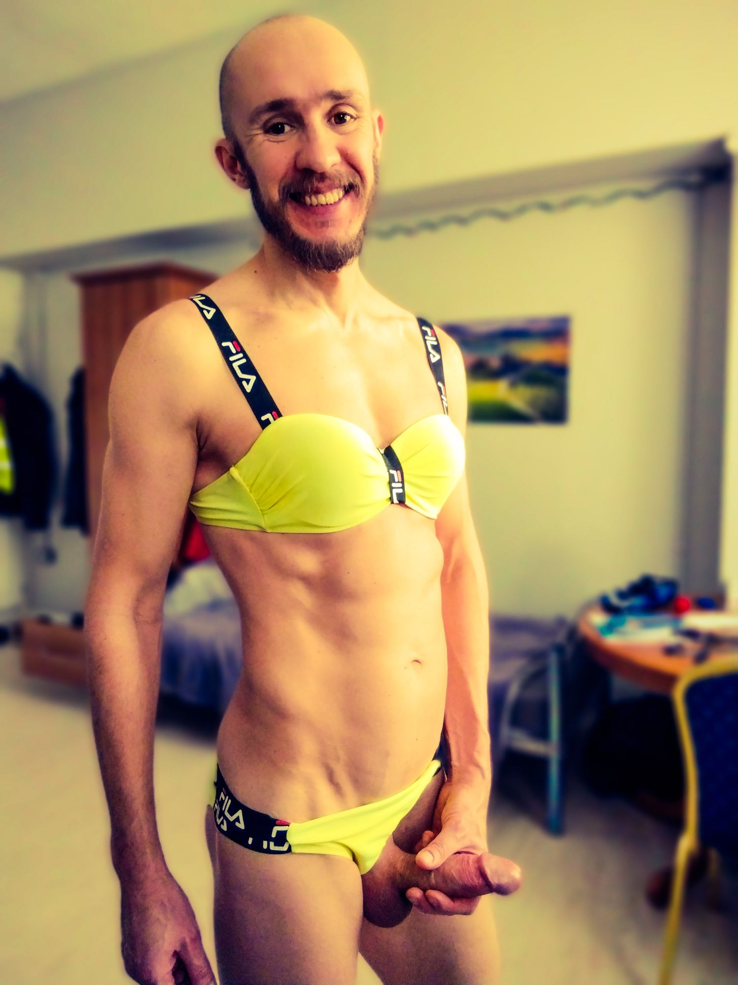 Bearded athletic man posing in yellow swimsuit  #13