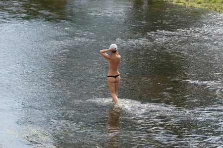 nude in rivers water         