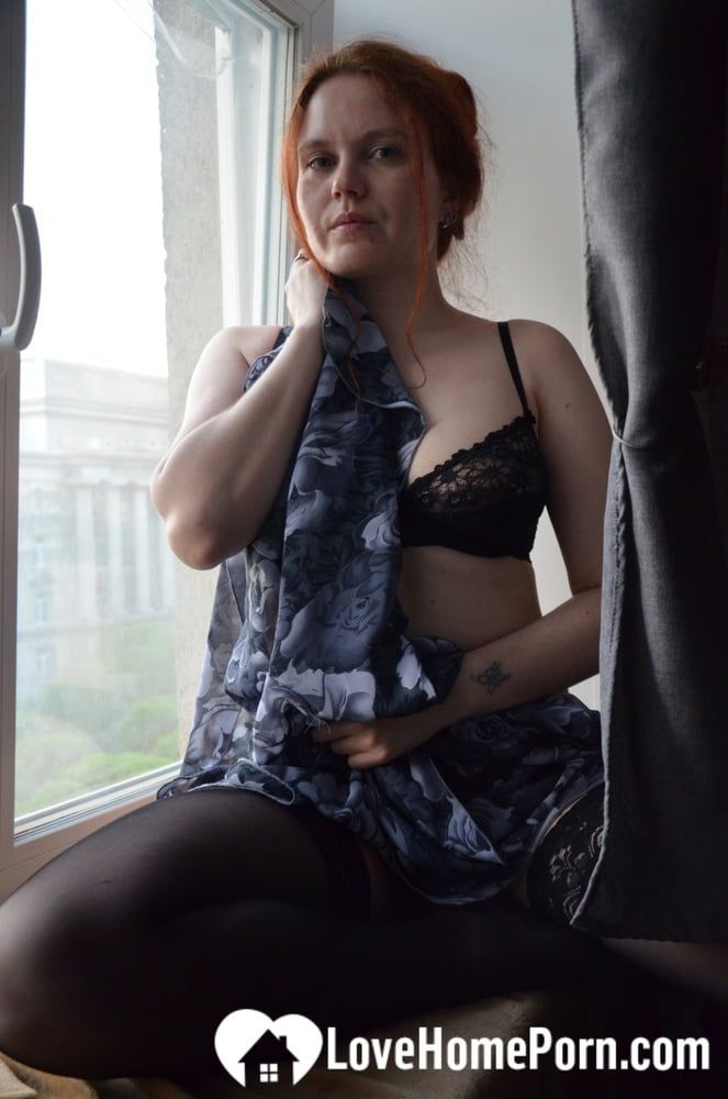 Posing by the window in a hot outfit #41