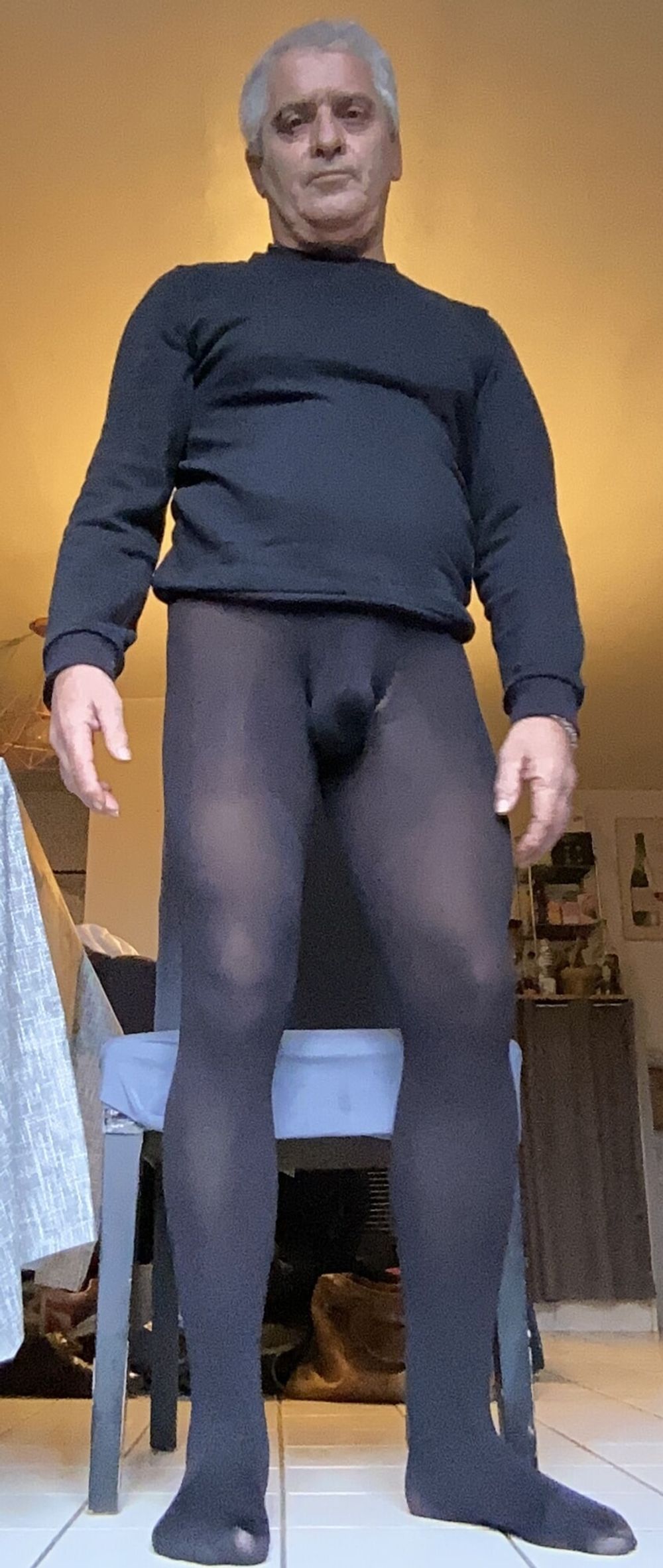 Fat Willy wears sugestive black tights . #8