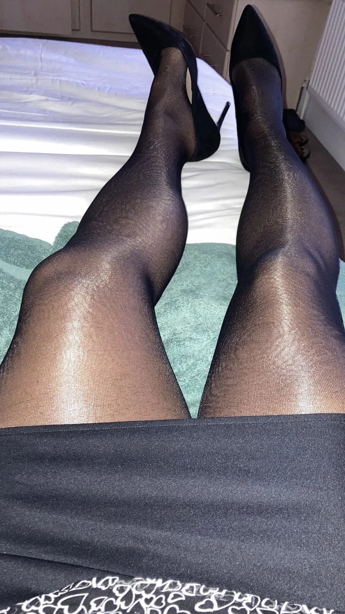 My legs in shiny glossy tights and sexy high heels