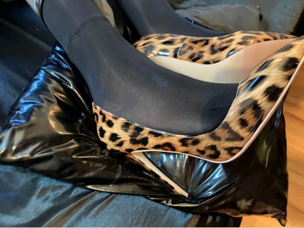 Black Leggings and Animal Print High Heels #8