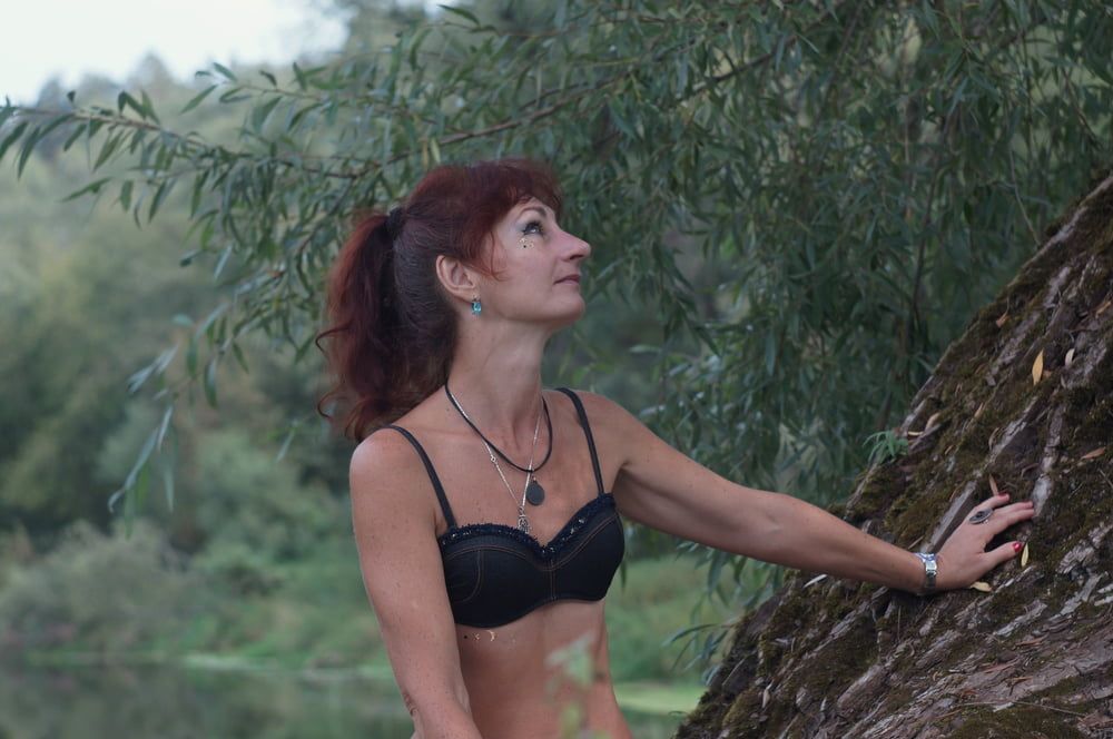 Black bikini near tree upon river #18