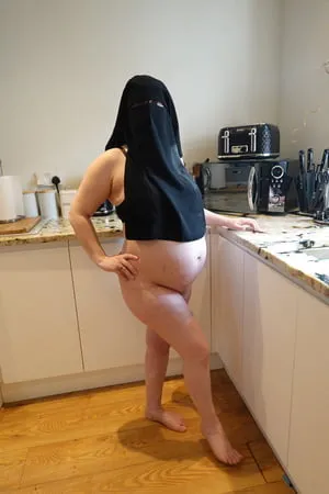 pregnant wife in muslim niqab and nursing bra         