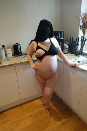 pregnant wife in muslim niqab and nursing bra         