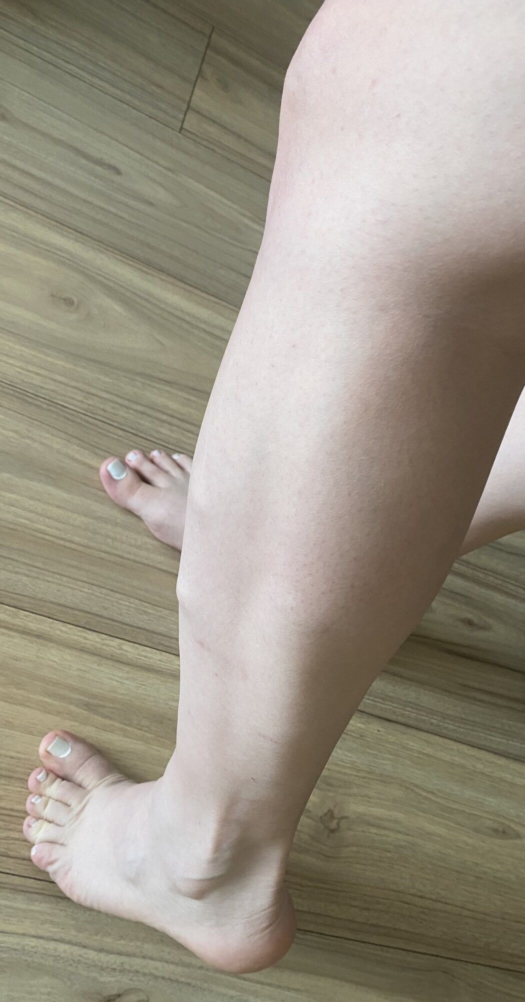 White polished nails and shaved legs #11