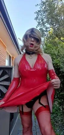 rachel wears red pvc dress         