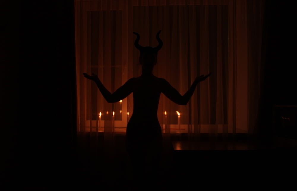 Naked Maleficent with Candles