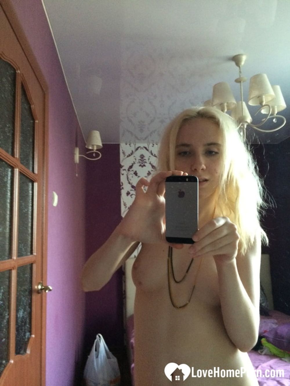 Skinny blonde cutie taking a couple of selfies #15