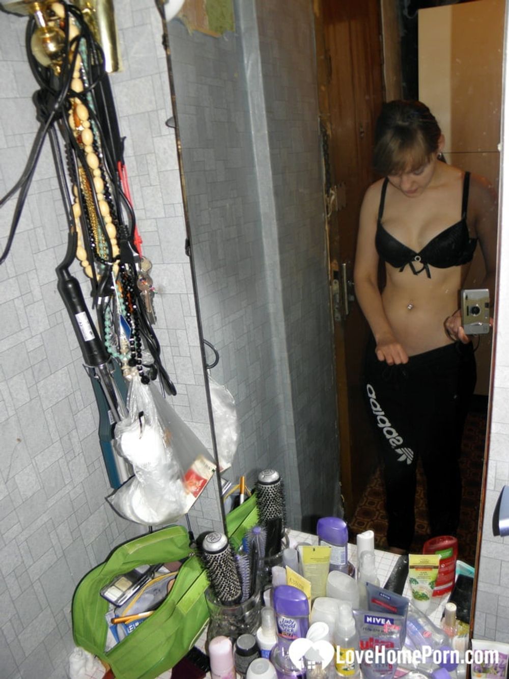 Petite teen slowly strips off her clothes #3