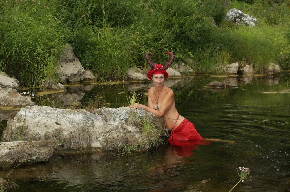 With Horns In Red Dress In Shallow River #13