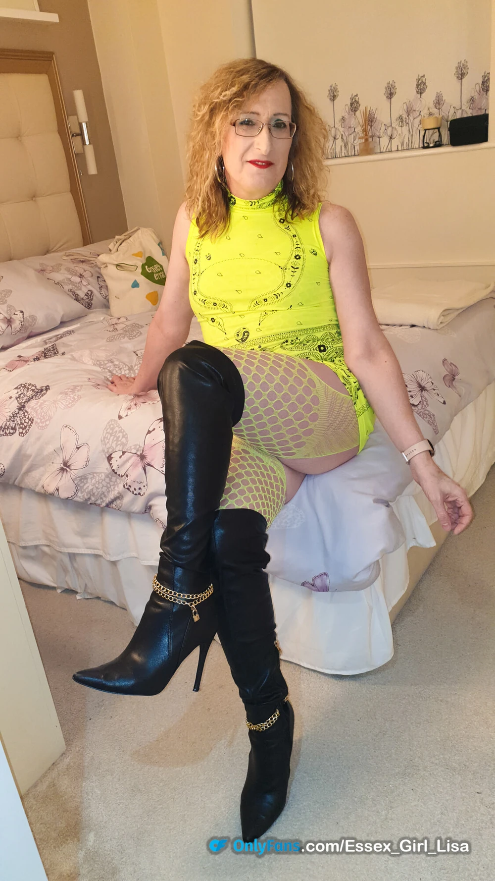 Essex Girl Lisa in neon yellow dress and black knee boots #14