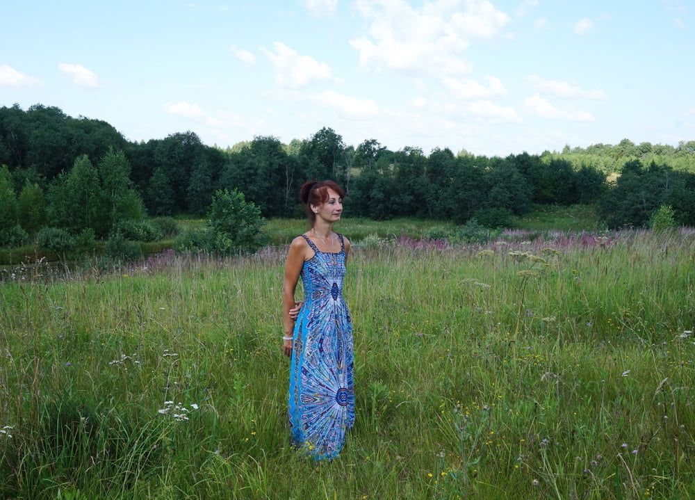 In blue dress in field #45