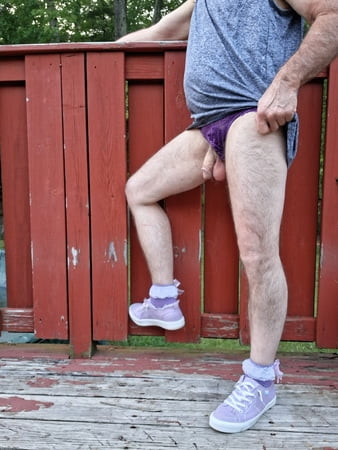 Outside in my purple sneakers