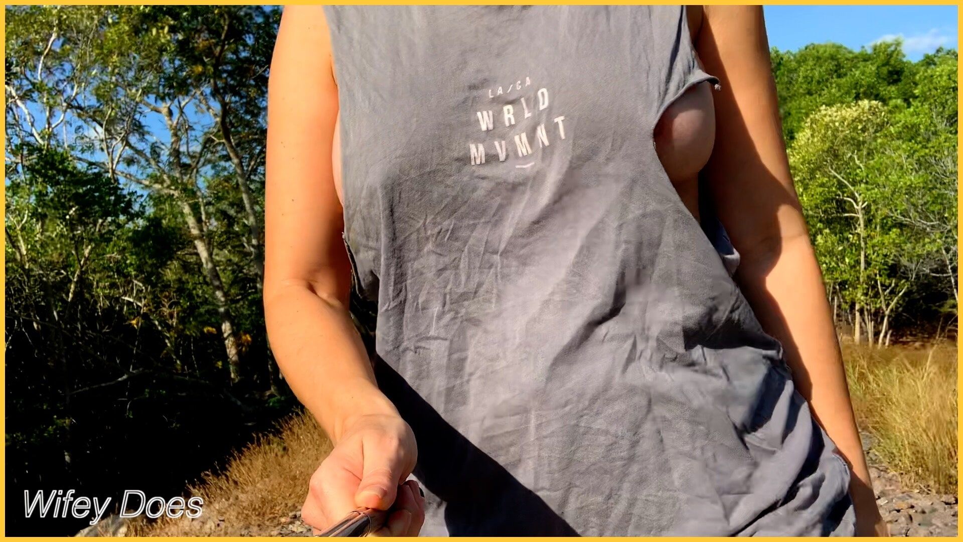 Wifey struts her stuff in a ripped shirt #2