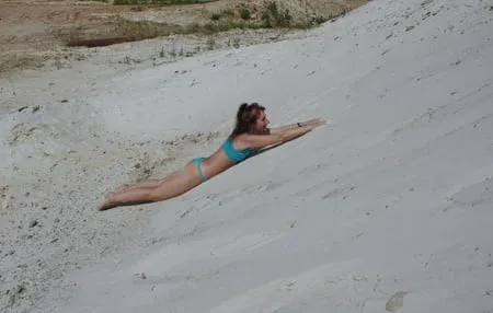 on white sand in turquos bikini         