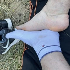 My sweaty socks and feet out of stinky sneakers 