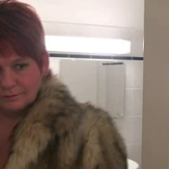 Secretly filmed in a fur coat