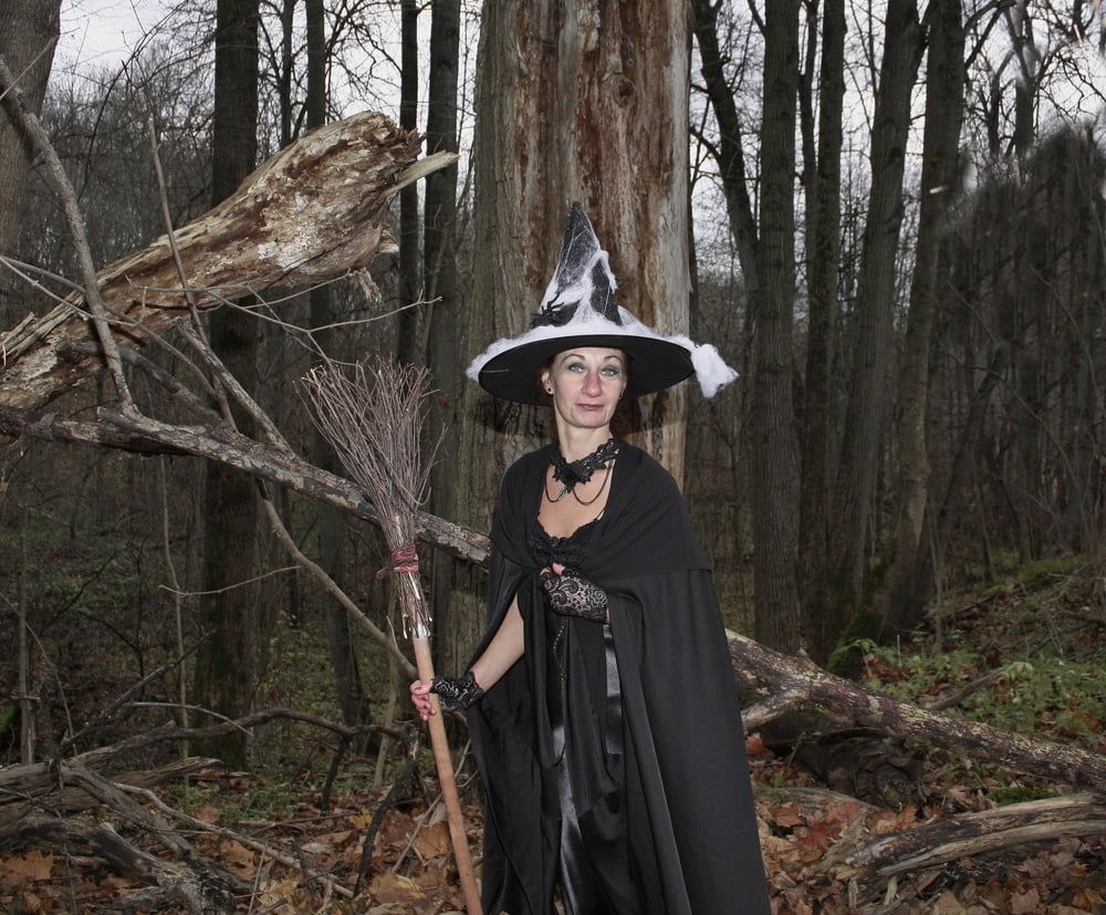 Witch with broom in forest #37