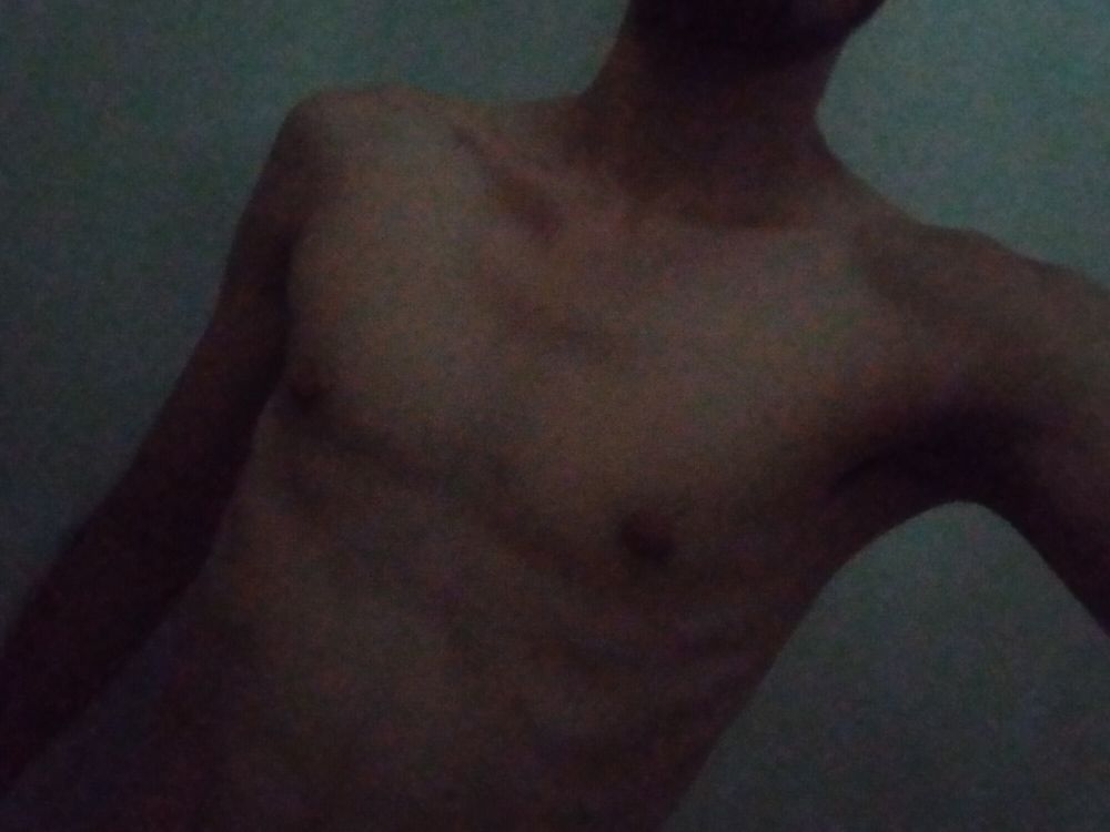 skinny guy takes photo in his shower #3