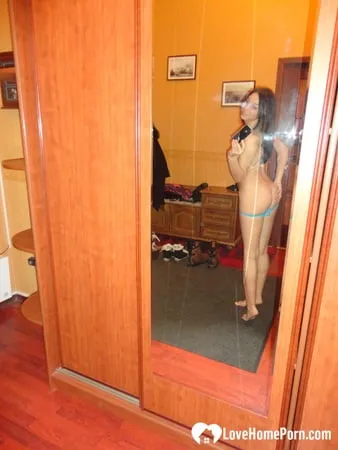 Hot teen shows her body in the mirror         