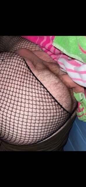 Large dildo in my ass wearing fishnets