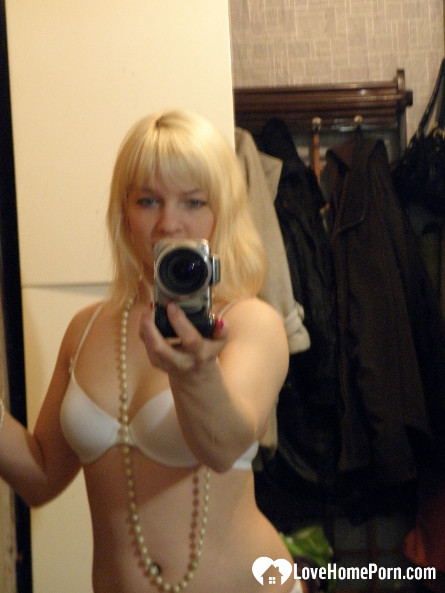 Aroused blonde in stockings taking naughty selfies #2