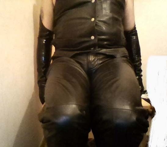 DRESSED IN BLACK TIGHT LEATHER. #50