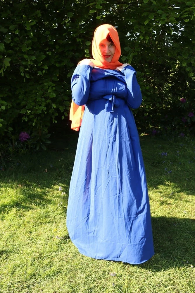 hijab and abaya flashing outdoors #3
