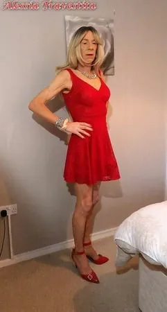    alessia travestita in flirty red dress         