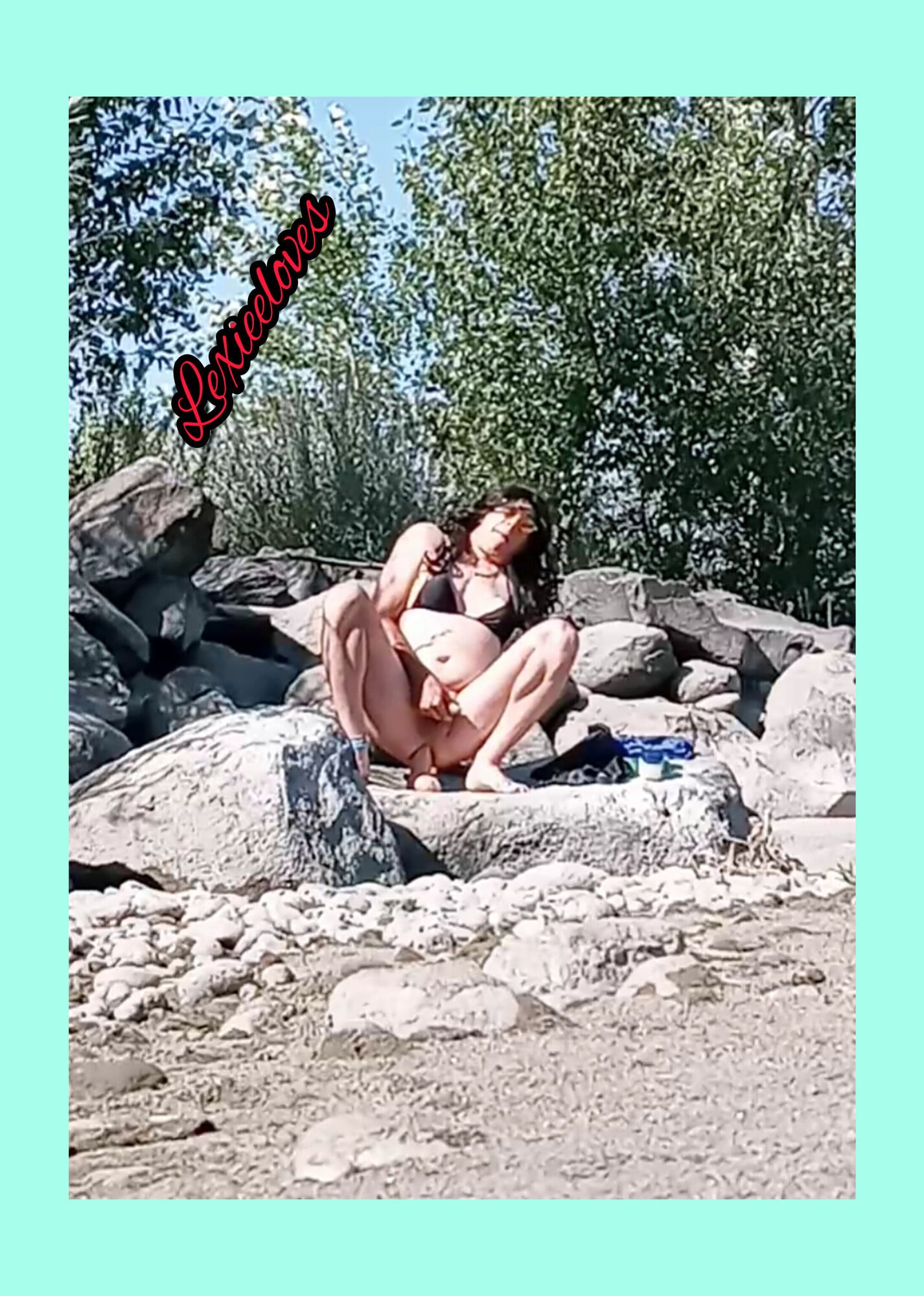 Lexiee playing around at the river in her black swimsuit  #3