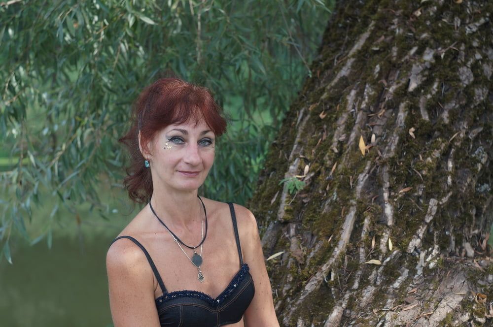 Black bikini near tree upon river #4