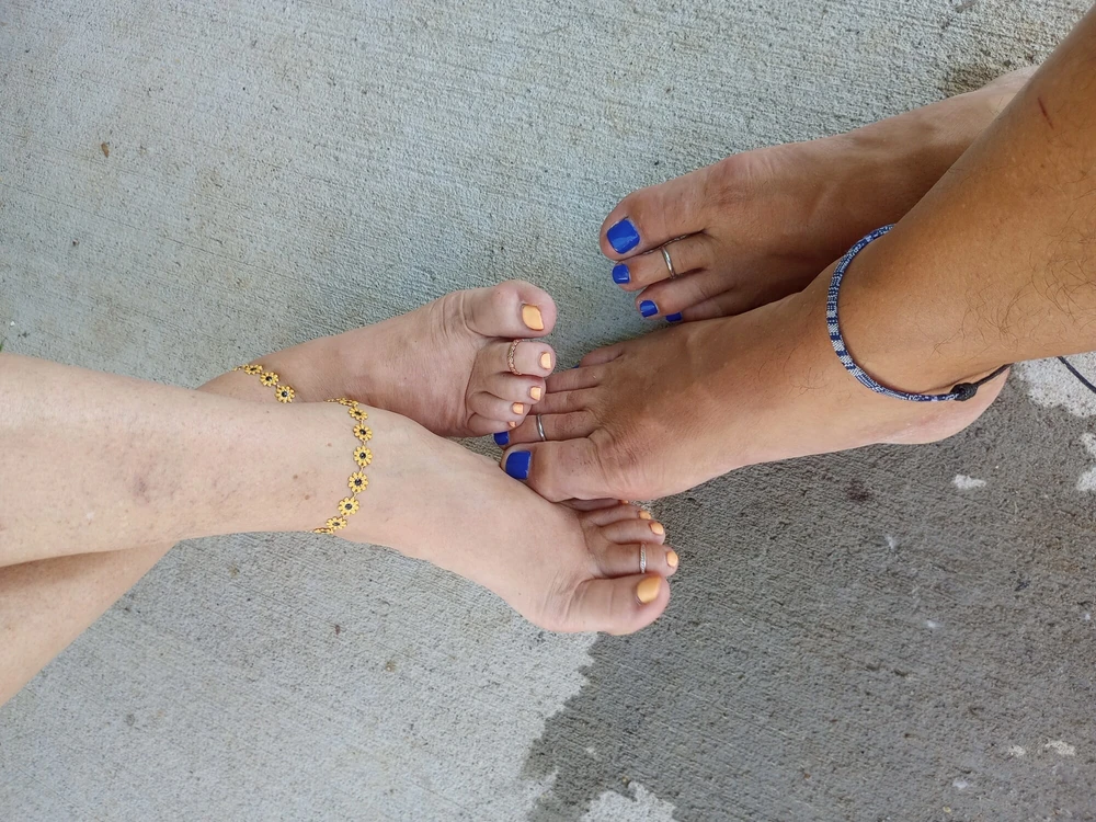 Showing off our pedicures in the pool #6