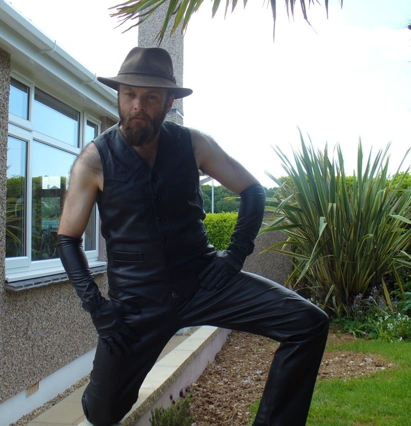 Leather Master outdoors posing in full leather
