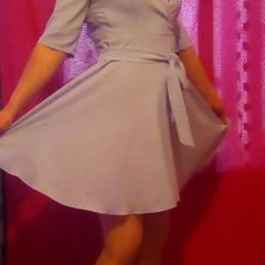 in a blue dress
