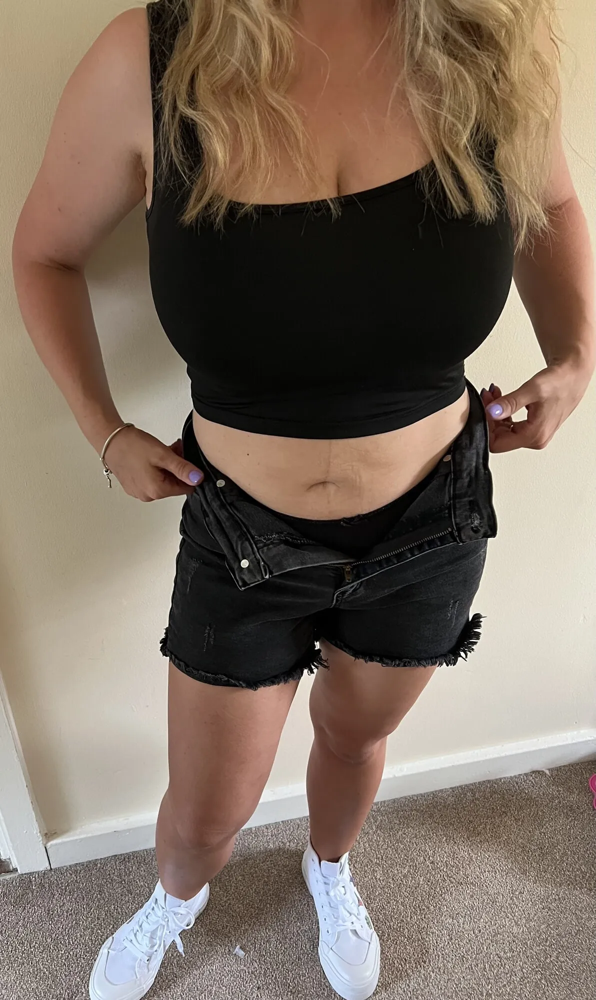 Big titted MILF in shorts and vest top #6