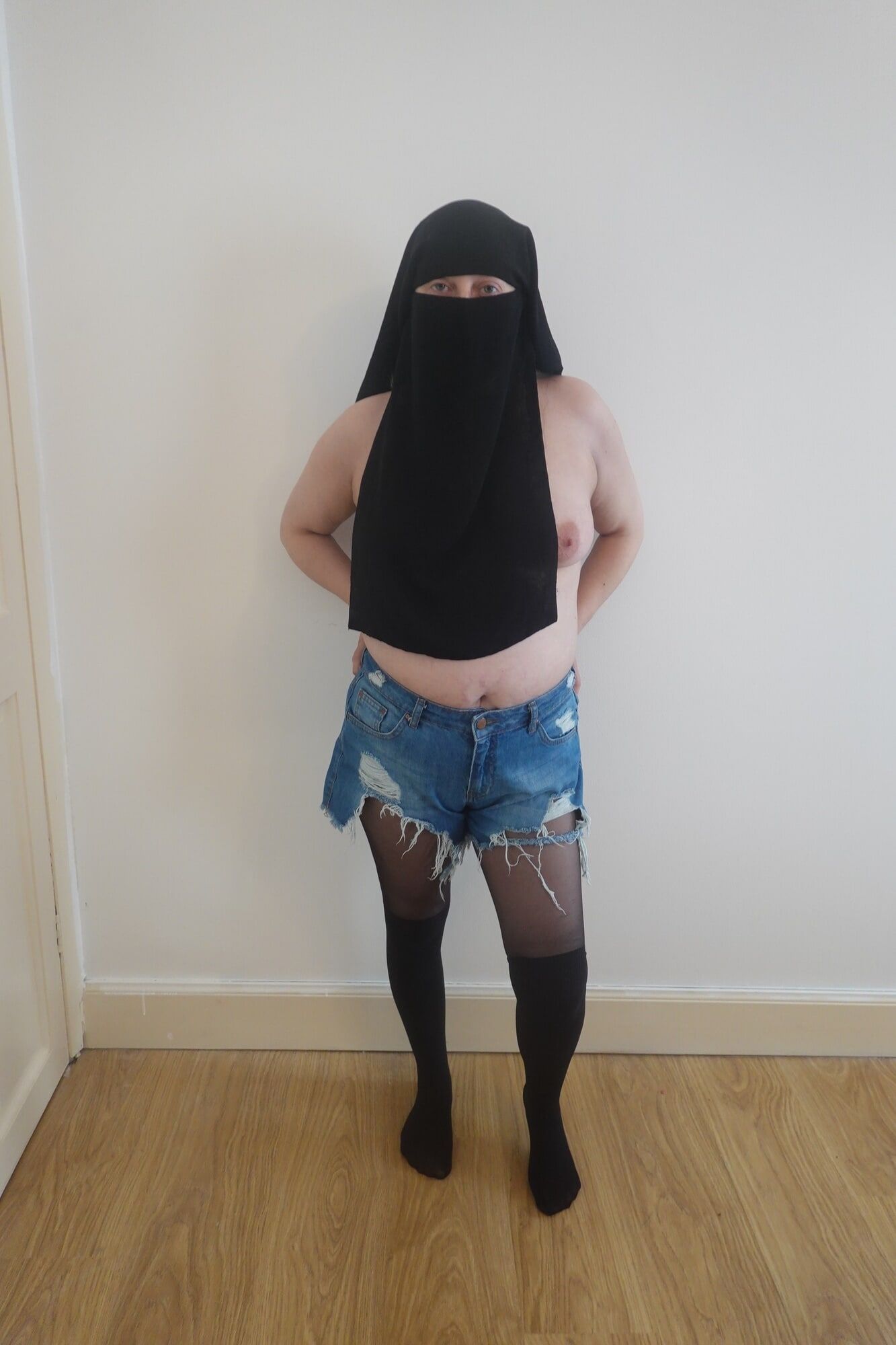 Wearing Shorts and pantyhose in Niqab 