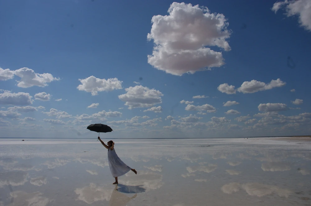 With Black umbrella on White Salt
