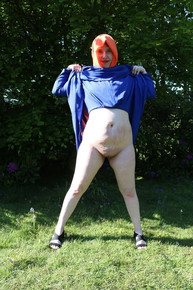 hijab and abaya flashing outdoors #8